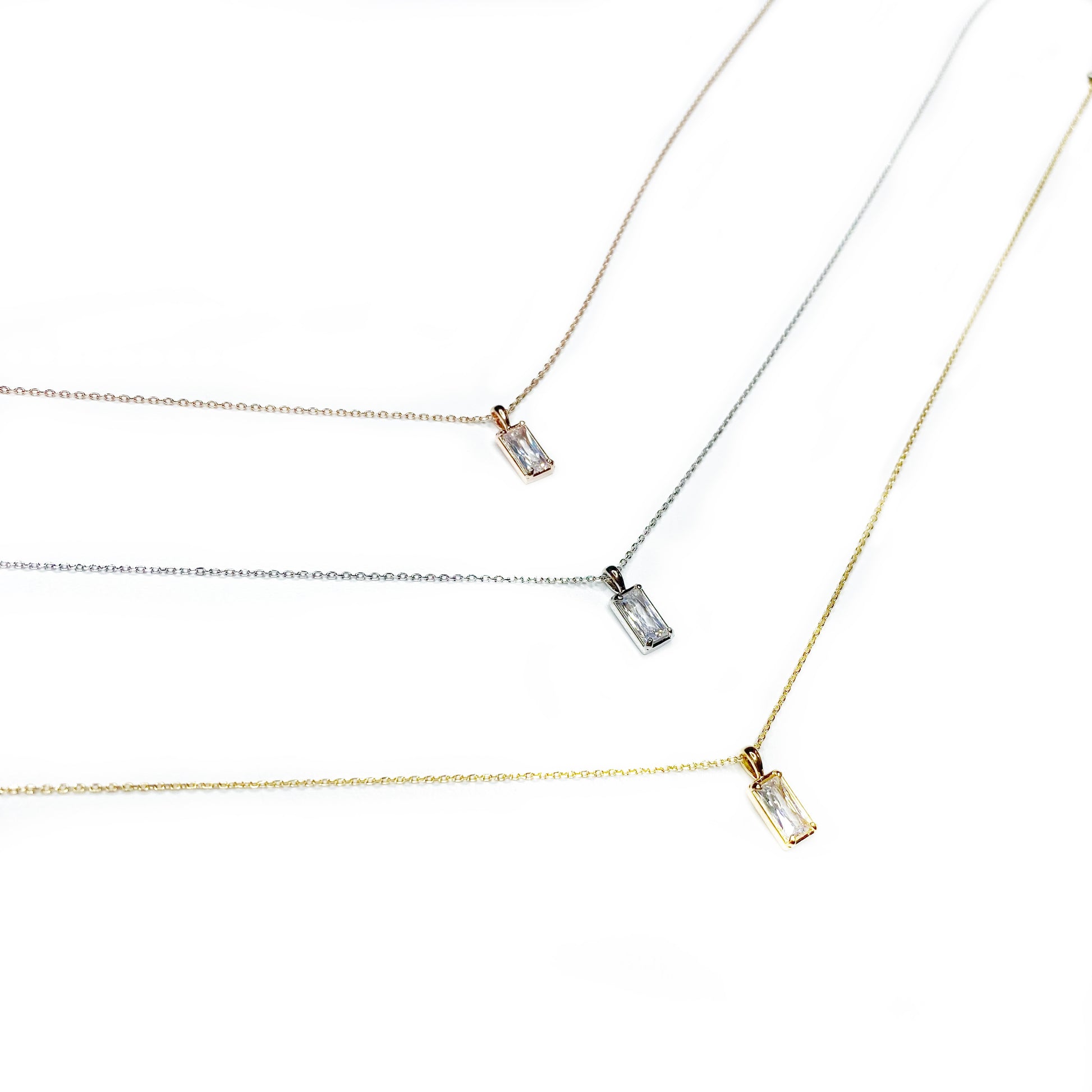 thin necklace with baguette charm