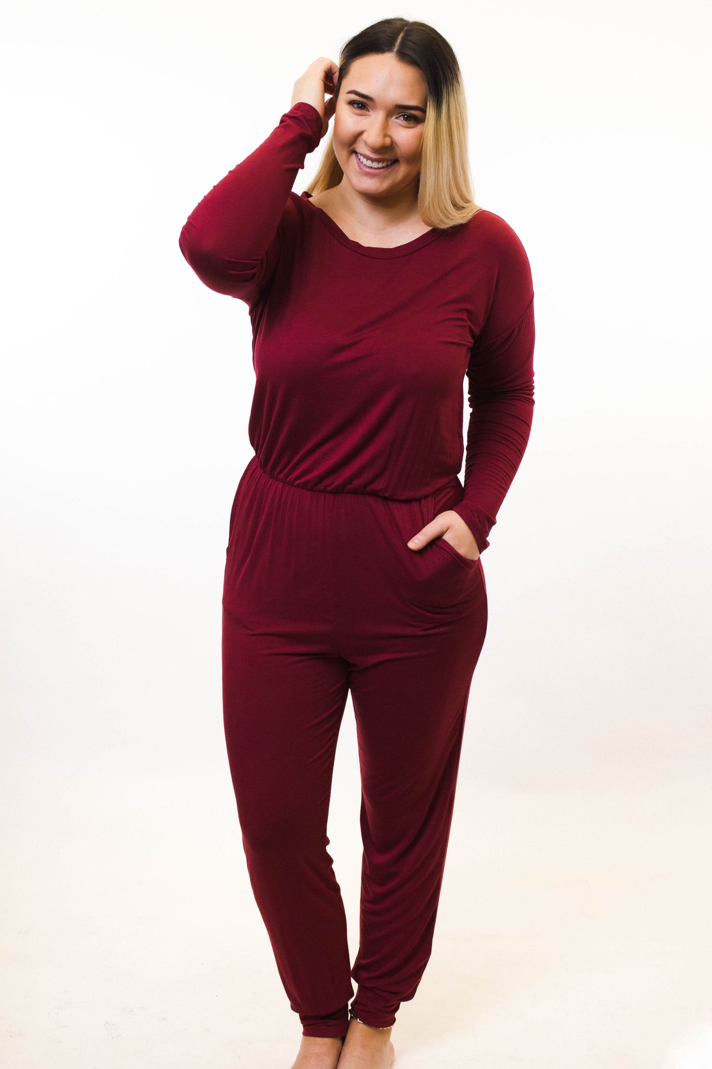 woman wearing red jumpsuit