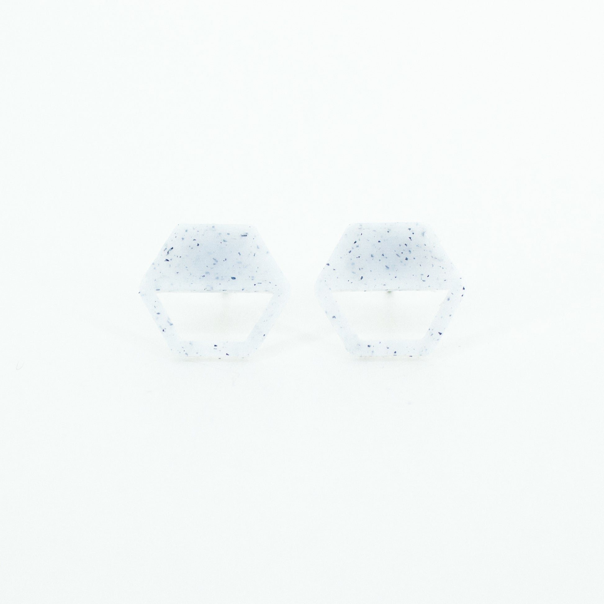 speckled black and white half full hexagon earring